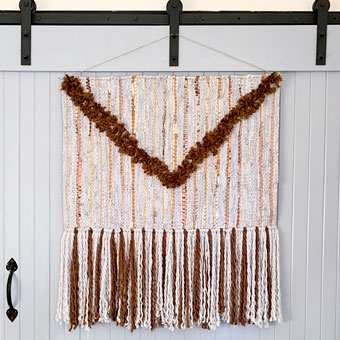 Make an Easy Wall Hanging from a Rug and Yarn