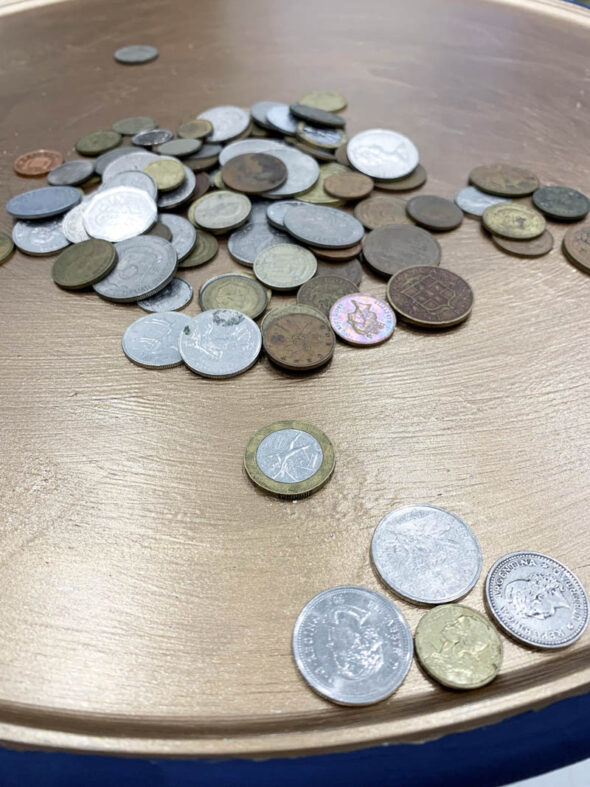 Resin topped side table with embedded coins