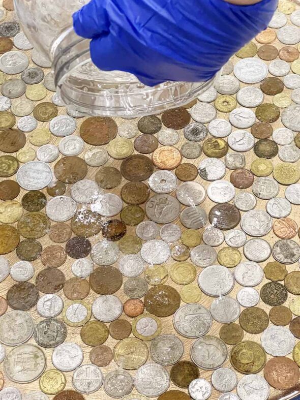 Resin topped side table with embedded coins