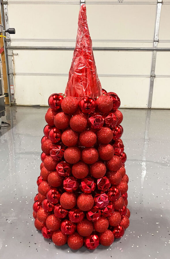 Christmas trees made from tomato cages and ornaments