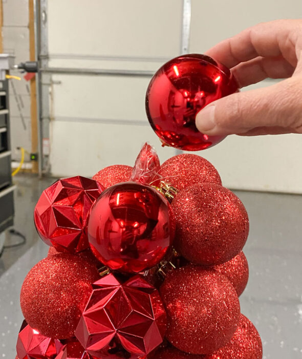 Christmas trees made from tomato cages and ornaments