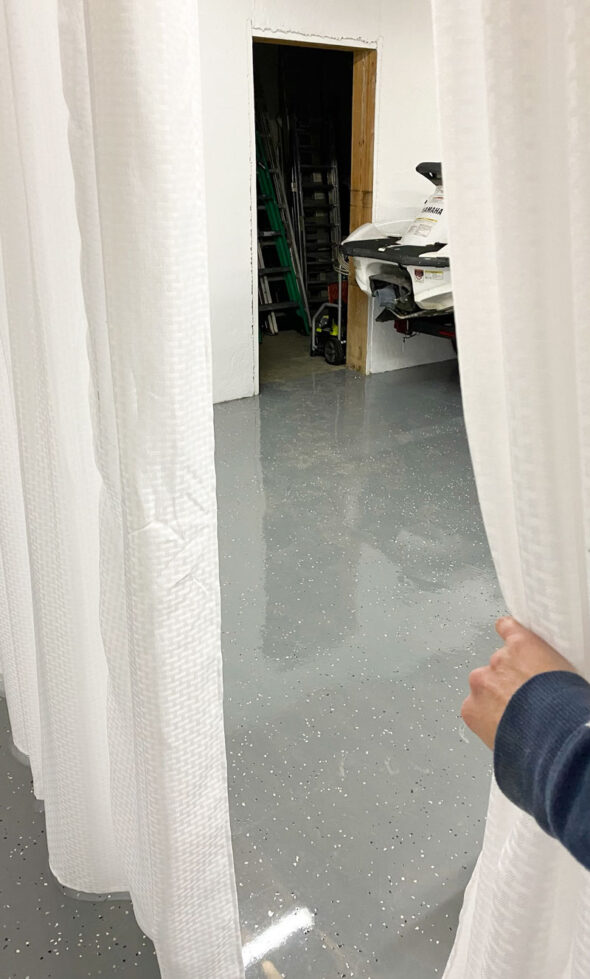 Easy custom sliding curtain divider for a storage area