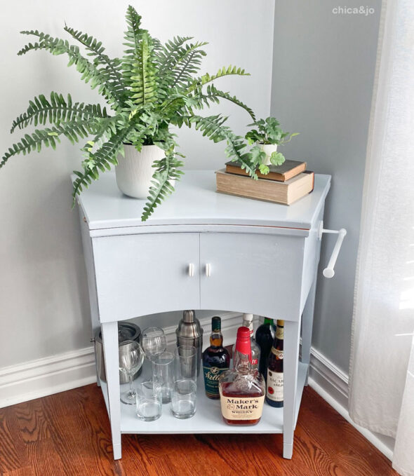 DIY bar cart from a vintage sewing machine cabinet