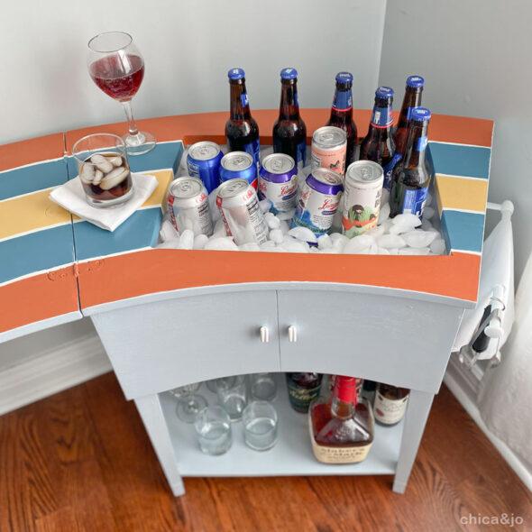 DIY bar cart from a vintage sewing machine cabinet