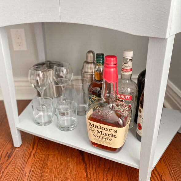 DIY bar cart from a vintage sewing machine cabinet