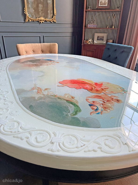 Unique layered resin dining room table with old world Italian fresco design