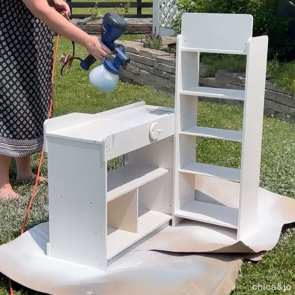 wedding activities for kids at a reception - painting a kids playset white