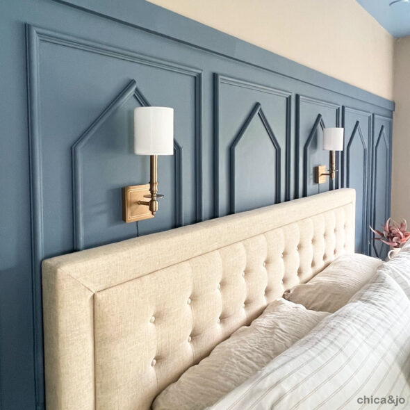 bedroom makeover wall sconces over bed