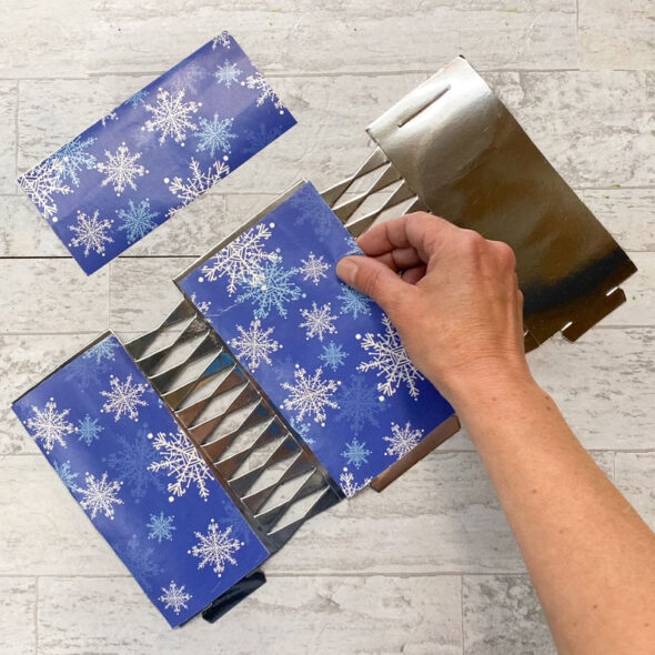 how to make christmas crackers easy - taping paper to template
