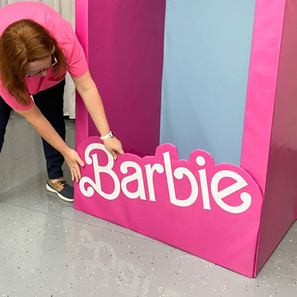 DIY Barbie box photo booth - barbie sign on front of box