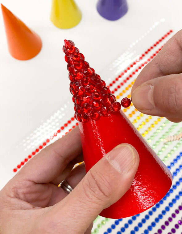 diy rhinestone gem christmas trees - adding red gems