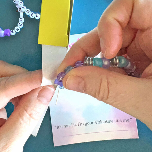 Taylor Swift Valentines Cards with Friendship Bracelets - Adding bracelets with glue dots