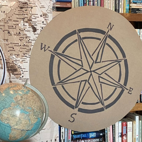 travel themed graduation party - giant compass