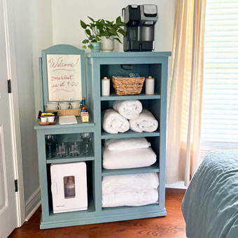 56 Guest Room Essentials in an Amenities Cabinet