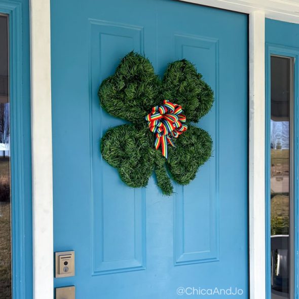 four-leaf clover wreath for st. patrick's day - hanging on door